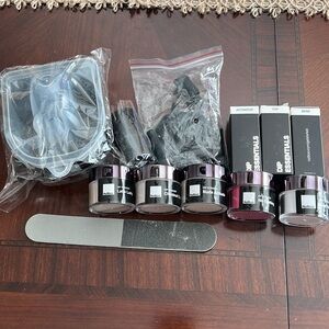 Nailboo set with 4 dip colors. Never used.